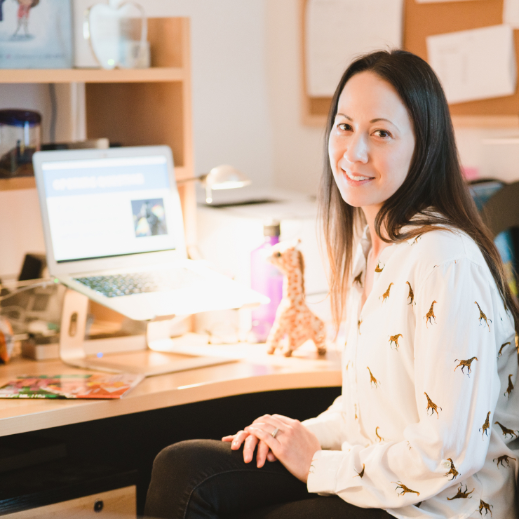 Teacher trained by UCSF HEARTS program to create a healthy environment for students during the global pandemic, at her computer - COVID-19 Response, CZI.